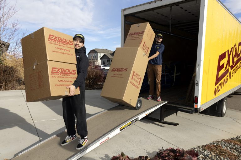 exodus movers with moving boxes