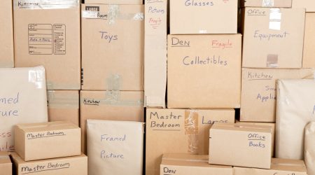 Wall with boxes labeled and ready for shipping