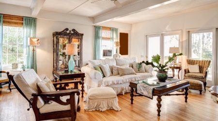 Modern eclectic livingroom with nice antique furniture.