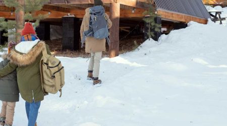 young-active-family-of-three-with-rucksacks-moving-2021-09-24-03-19-27-utc